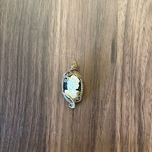 Elegant Gold Cameo Pendant